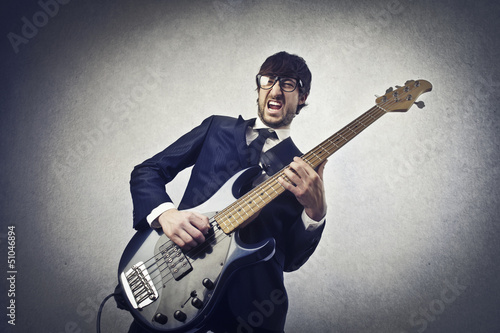 Photo: man playing bass man playing bass