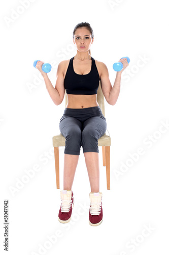 Photo: Young Woman Exercising Young Woman Exercising