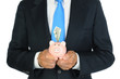 Businessman Holding Piggy Bank