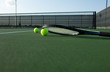 Tennis Balls and a Racket