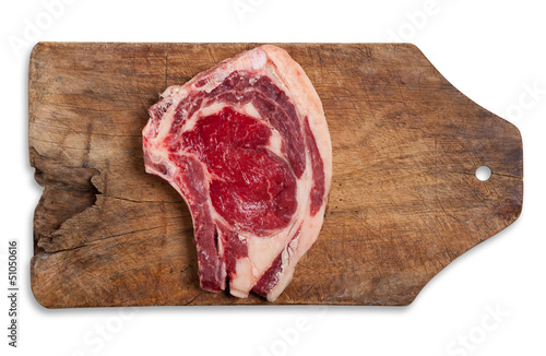 Photo: Beef on table, isolated. Beef on table, isolated.