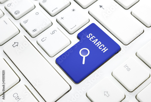 Photo: Search business concept, blue enter button or key on white keybo Search business concept, blue enter button or key on white keybo