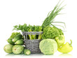 fresh green vegetables in basket isolated on white