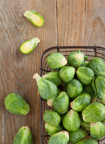 Photo: Brussels sprouts on wooden table Brussels sprouts on wooden table