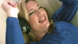 Woman listening to music with headphones