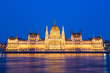 Photo: Parliament and Danau in Budapest at Twilight Parliament and Danau in Budapest at Twilight