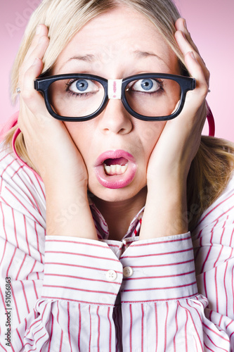Photo: Hysterical business woman having panic attack Hysterical business woman having panic attack