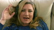 Woman listening to music with headphones