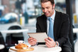 Business executive at open restaurant