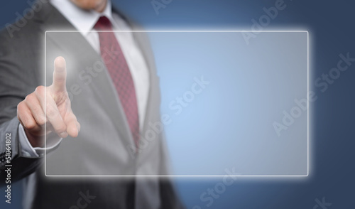 Photo: Man touching display Man touching display