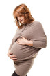 Pregnant woman looking her tummy
