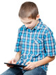 Kid playing with a tablet computer