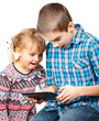 Children playing with a tablet computer