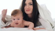 Family mother and a small child playing