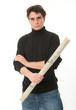 Foto: Young man with roll of blueprints Young man with roll of blueprints