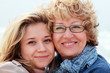 Photo: Mother and daughter on a winter beach Mother and daughter on a winter beach