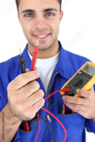 Photo: Electrician displaying voltmeter Electrician displaying voltmeter