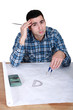Architect with drawings