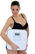 Woman in underwear carrying scales