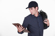 Electrician holding clipboard