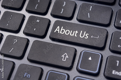 Photo: about us concept, message on keyboard about us concept, message on keyboard