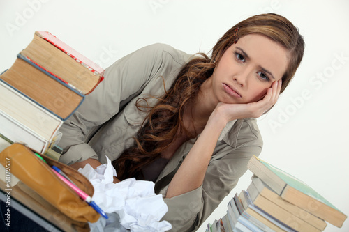 Photo: female student fed up with studying female student fed up with studying