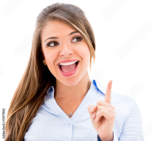 Photo: Business woman pointing up Business woman pointing up