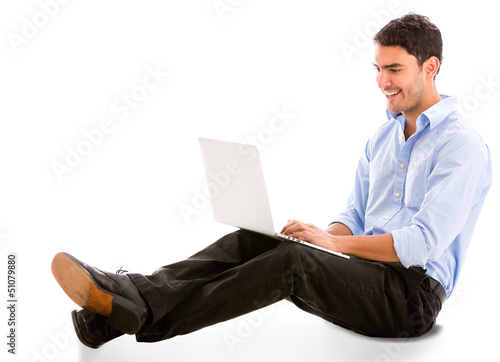 Photo: Business man with a laptop Business man with a laptop