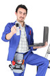 plumber with computer showing phone