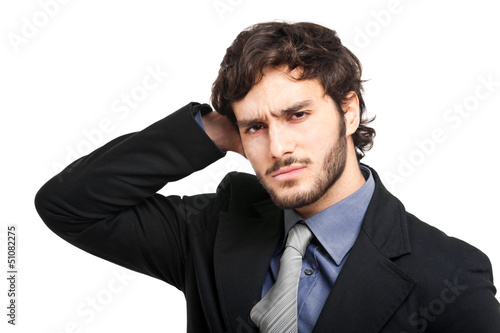 Photo: Worried businessman isolated on white Worried businessman isolated on white