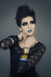 Beautiful woman with short hair and makeup cosmetics