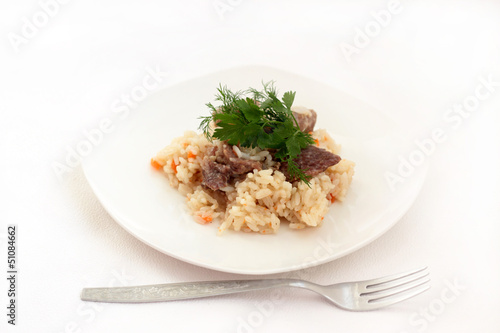 Photo: Rice and meat with vegetables. Rice and meat with vegetables.