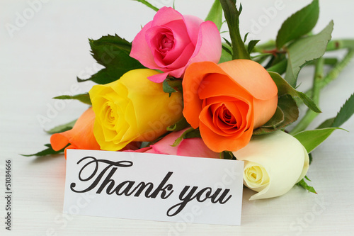 Photo: Thank you note and colorful bouquet of roses Thank you note and colorful bouquet of roses