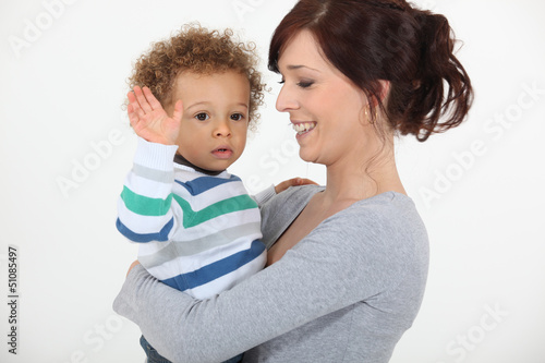 Photo: Child waving good-bye Child waving good-bye