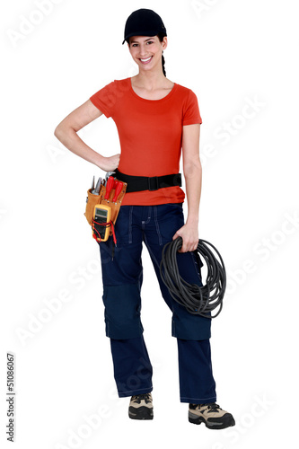 Photo: Female electrician raring to go Female electrician raring to go