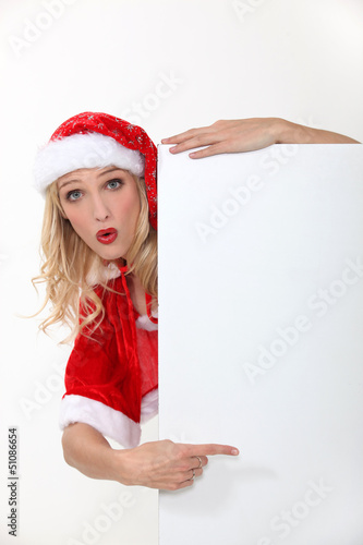 Photo: Blond female in Santa costume Blond female in Santa costume