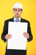Architect holding advertising panel