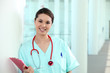 Photo: A medical professional with a clipboard A medical professional with a clipboard