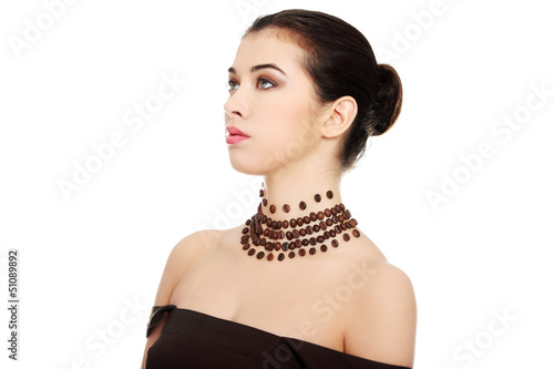 Photo: Woman with necklace made frome coffee beans Woman with necklace made frome coffee beans