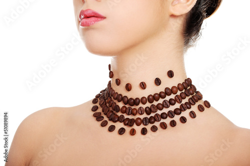 Photo: Woman with necklace made frome coffee beans Woman with necklace made frome coffee beans