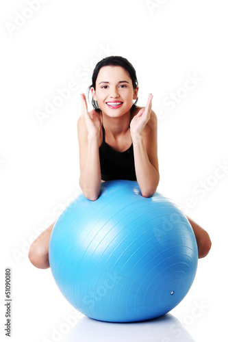 Photo: Beautiful woman with pilates exercise ball. Beautiful woman with pilates exercise ball.