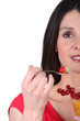 Brunette woman with fruit cup