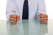 Male with fists on the table