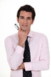 Businessman holding glasses