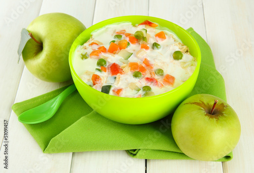Photo: tasty dieting food and apples on wooden table tasty dieting food and apples on wooden table