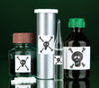 Deadly poison in bottles on black background