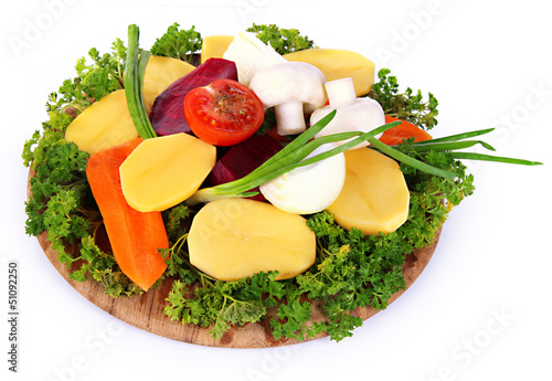 Photo: Many peeled vegetables isolated on white Many peeled vegetables isolated on white