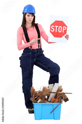 Photo: Tradeswoman campaigning against waste Tradeswoman campaigning against waste
