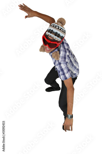 Photo: Boy dressed in snowboarding apparel Boy dressed in snowboarding apparel