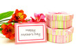 Happy Mother's Day tag with flowers and gift boxes